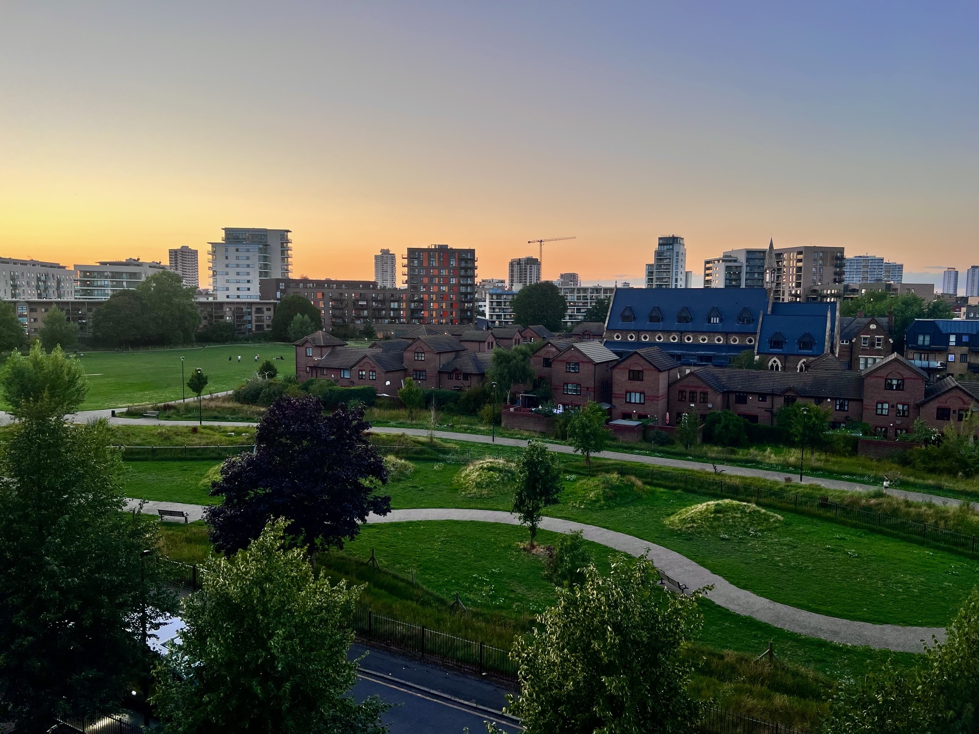 Evening view over the park near Canary Wharf, E14 London
