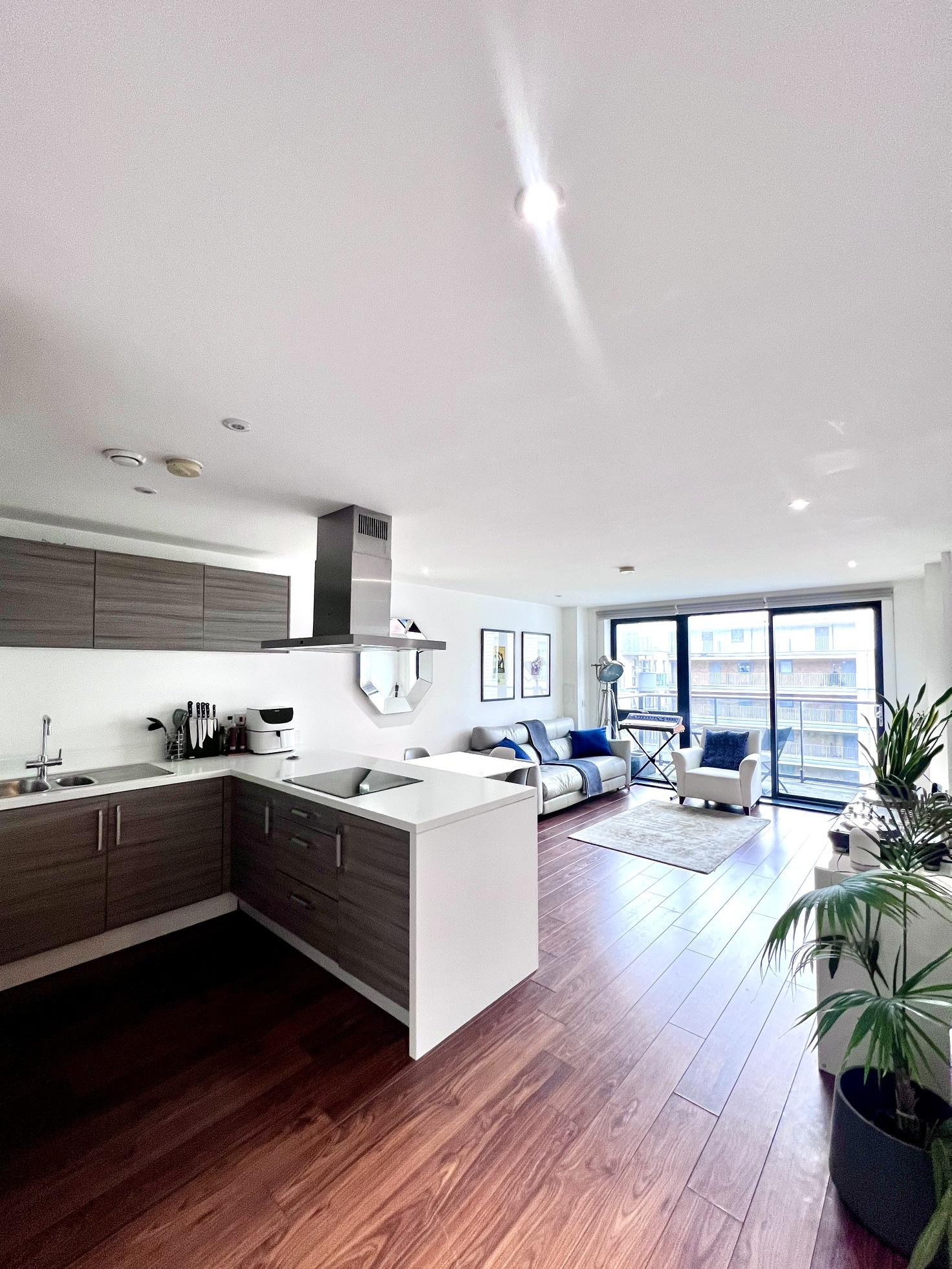 Canary Wharf short let — open-plan living room and kitchen, E14 London